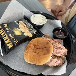 Notorious P.I.G. with slaw and bbq sauce on the side