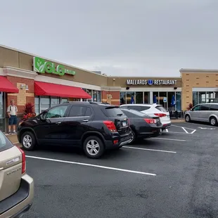 a parking lot with cars parked in it