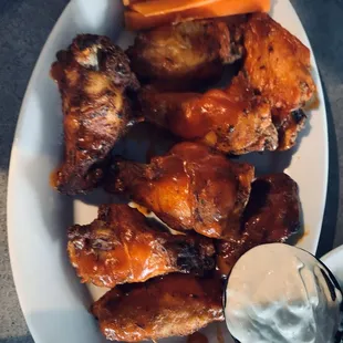 Wings were tasty and big.  Blue cheese great.  Spicy for Buffalo style tho.  8/10.