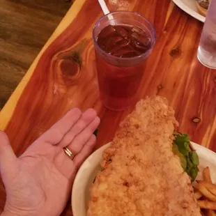Pork tenderloin sandwich is huge!