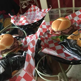 two sandwiches on a table
