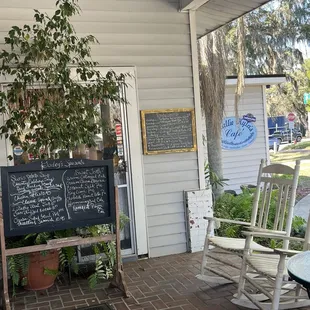 front porch with rocking chairs