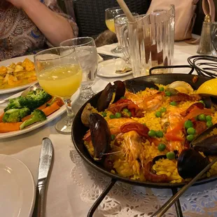 Orange Roughy with Shrimp in White Wine Sauce, Paella Valenciana, &amp; nectar of the gods.
