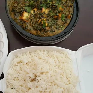 a plate of rice and a bowl of soup