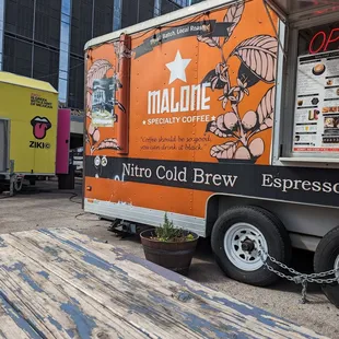 a coffee truck parked in a parking lot