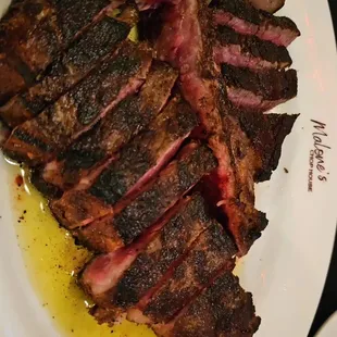 sliced steak on a plate