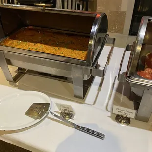 a buffet table with a buffet set up