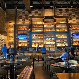 a view of the bar and dining area