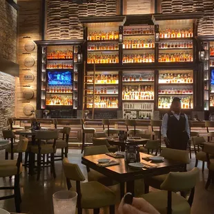 a view of the bar and dining area