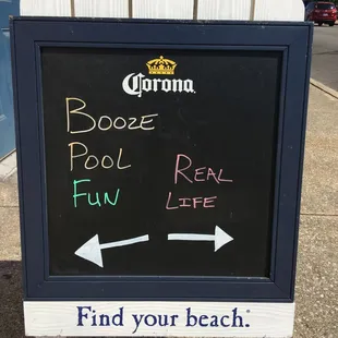 a blackboard with the words booze pool fun, rental life, and find your beach