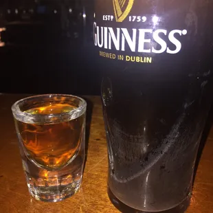 a pint and a glass of guinness