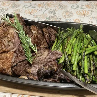 a steak and asparagus