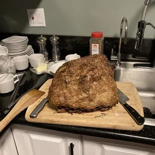a loaf of meat on a cutting board