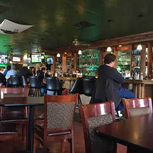 a man sitting at a bar