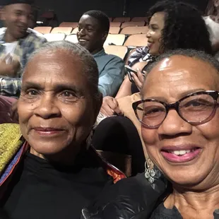 two women smiling for the camera