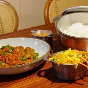 two bowls of food on a table