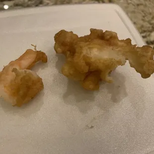 Way more batter (right) than the actual shrimp (left) on each piece.