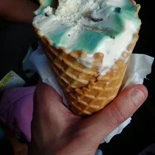 Mint chocolate / chocolate chip cookie dough waffle cone