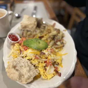 a plate of food and a cup of coffee