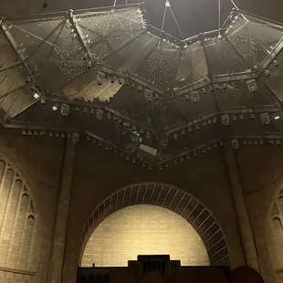 Acoustic screen above the stage reflected all the candle flames in such a cool way