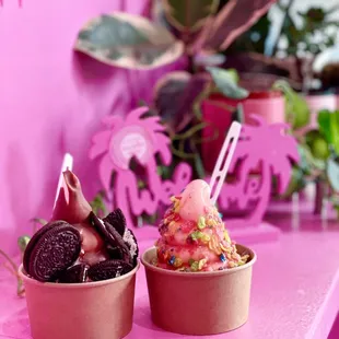 Soft Serve w/Oreos &amp; Chocolate (L) and Soft Serve w/Fresh Strawberry Sauce &amp; Fruity Pebbles (R)