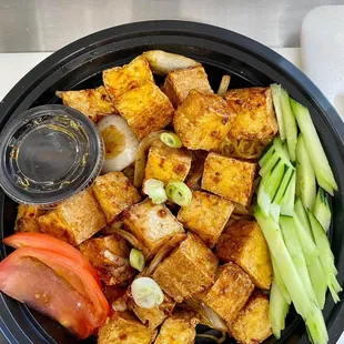 a bowl of tofu and vegetables