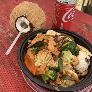 a bowl of food and a drink