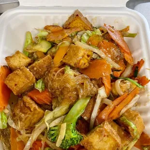 a take out container of food