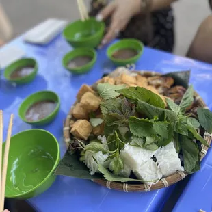 a plate of food on a blue table