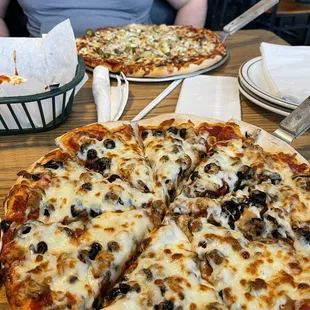 Sausage, olives, and mushrooms :) 12&quot; pan for him and I- with plenty leftovers! Eyes bigger than the stomach.