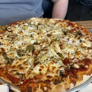 Pineapple, jalapeños, pepperoni, and mushrooms