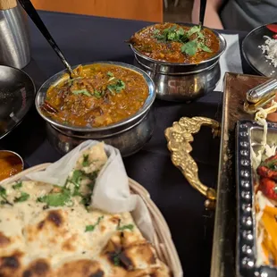 Garlic naan and chettinad chicken and lamb rogan mutton