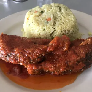 Fish stew with fried rice. They said it wasn't spicy but I would call it about a low to medium spicy