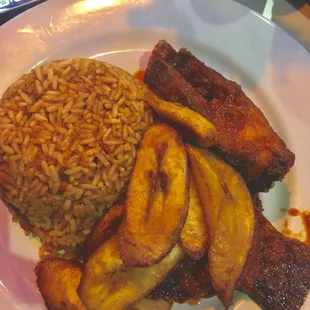 Jollof rice w/ fish stew -Rating:10/10