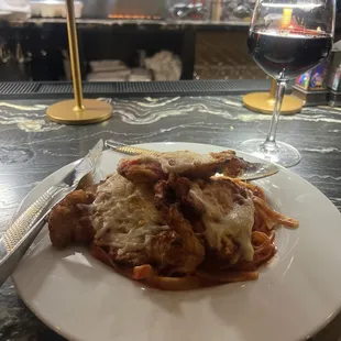 Chicken Parm with homemade fettuccine . You won&apos;t be disappointed with the sauce.