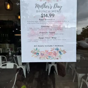 a sign in the window of a restaurant