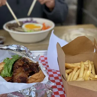 a person eating a meal with chopsticks