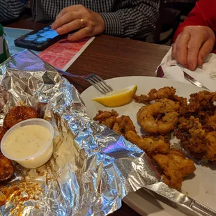 Good buffalo &amp; bbq wings, good calamari (some fancy places are worse), and good service. Shrimp average.