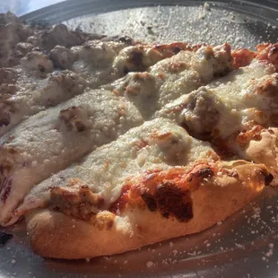 Delicious slice sausage pizza Mama Ciminos approved!