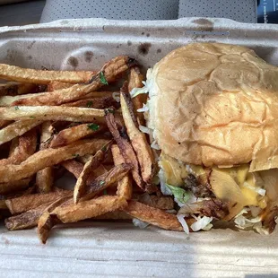 Kids cheeseburger with added veggies.