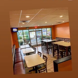 a restaurant with tables and chairs