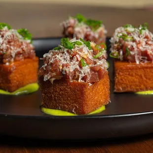 a plate of appetizers on a table