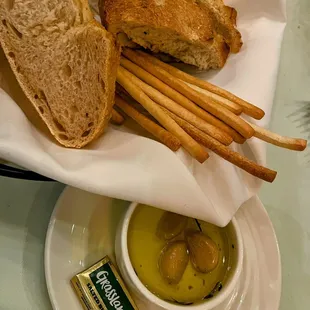 Bread basket, great bread &amp; breadsticks. Smear that garlic confit onto your bread and dip into the flavorful olive oil, smashing!