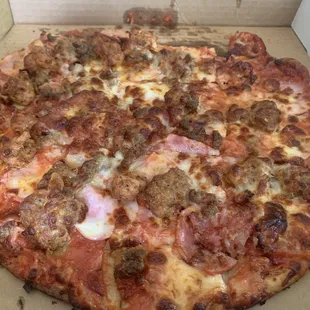 Carne Amore pizza, Pepperoni, Sausage, Hamburger, Canadian Bacon, Bacon, Extra Cheese. Put Their Spicy Sausage on half......incredible pie!