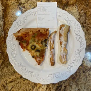 a slice of pizza and bacon