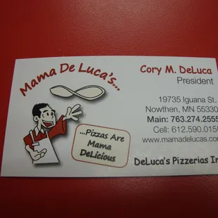 Business card with contact info.