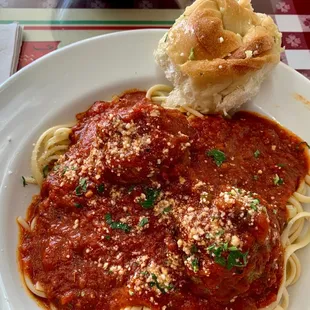 Spaghetti and meatballs  Homemade yeast roll! Melts in your mouth.  Sauce is the best I've ever had.