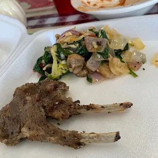 Lamb Chops, Marinated, fresh veggies with spaghetti side (missing).
