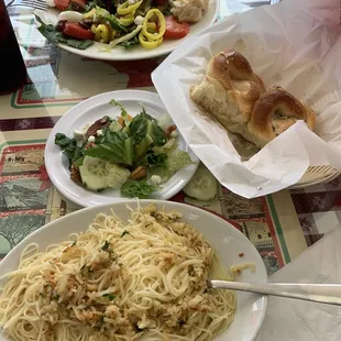 Mediterranean salad and Angel hair with garlic and oil. Fresh made rolls to die for