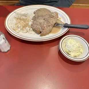 Smothered Pork Chops, Rice &amp; Gravy - Side, Potato Salad - Side